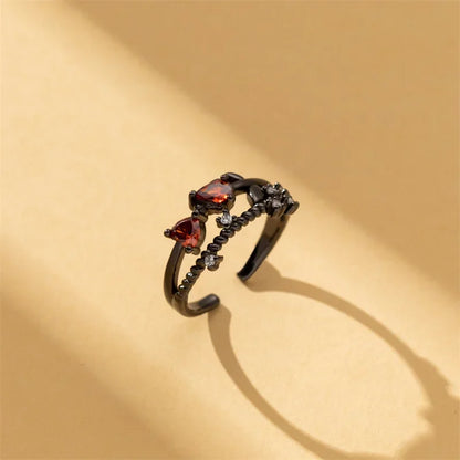 Aerix Vanta Goth Ring mit rotem Kristall